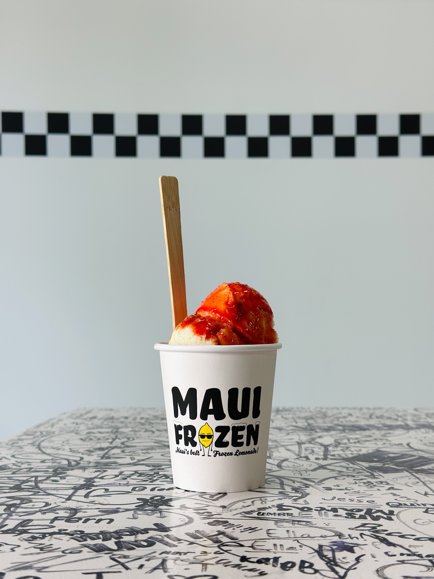 Pineapple Scoop Ice cup with li hing drizzle