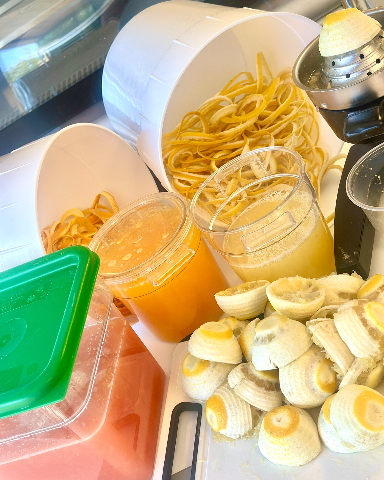 Fresh lemons and citrus being juiced for Maui Slush
